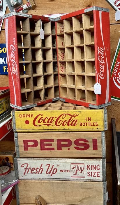 Crates includig Coca Cola, Pepsi, 7up